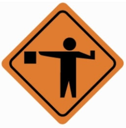 ماذا ينبغي عليك أن تتصرف عند رؤيتك لعامل على الطريق أمامك وهو يحمل إشارة المرور هذه: