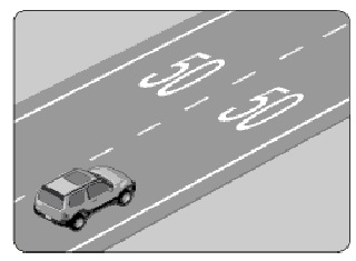 حسب الاشارات الافقية المرسومة على الطريق في الشكل كيف يجب ان يتصرف سائق المركبة ؟